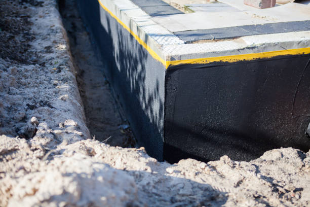Professional Waterproofing technician working in Waterloo, IN